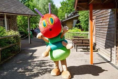 A series of images showcasing The Very Hungry Caterpillar at Gulliver's Theme Park Resorts